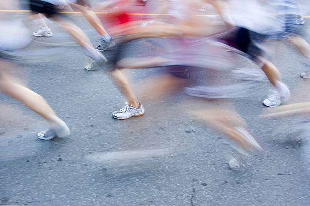 istock Marathon runners go by in a blur 172937593