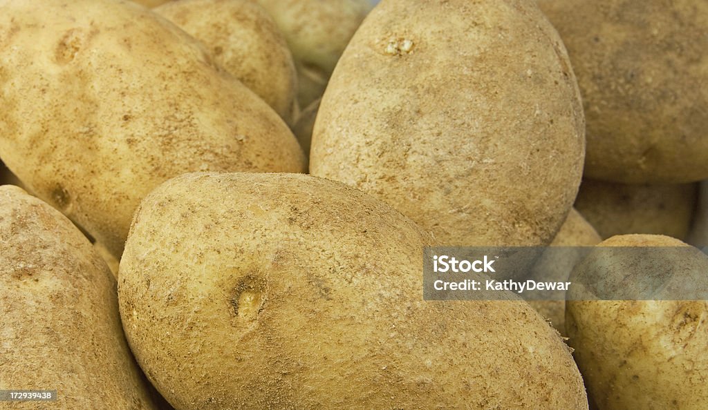 Potatos de cerca - Foto de stock de Patata russet libre de derechos
