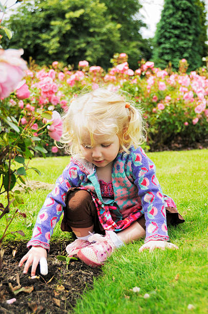 istock little girl relaxing in a garden 172939773