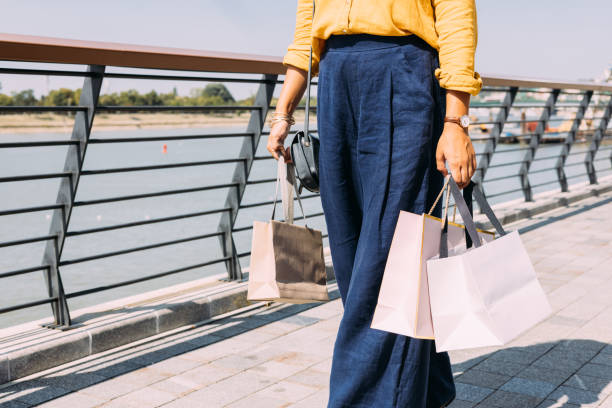 istock An Unrecognizable Beautiful Woman Going Shopping 1729401976