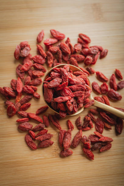 istock Goji berries on a wooden background 1729403147