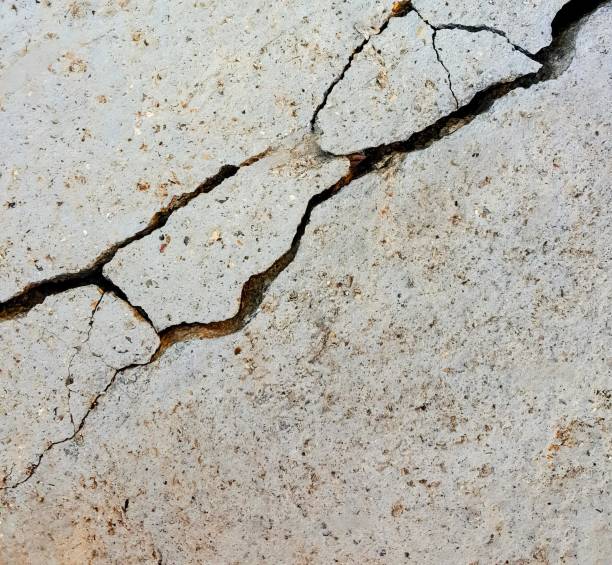 istock a cracked wall with a crack in it. 1729417189