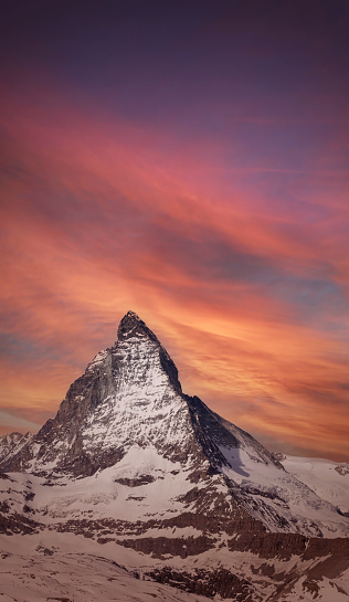 The vertical sunset view of banner Matterhorn and snow mountains  view at Gornergrat, Switzerland