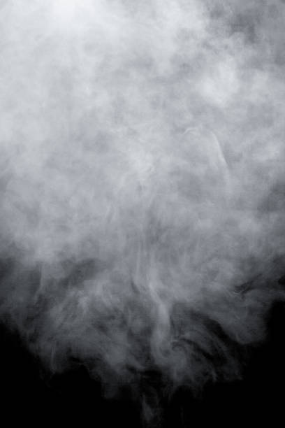 istock white smoke isolated, abstract powder, water spray on black background. 1729421459