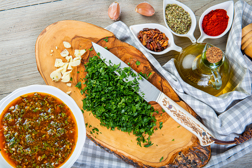 Chimichurri argentine sauce and ingredients  to prepare it