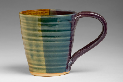 Handmade mug on a grey kitchen counter