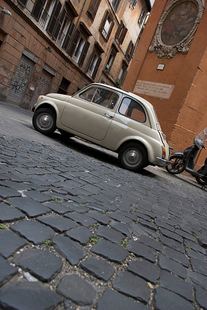 istock Antique Small Car Cobblestone Street 172943321