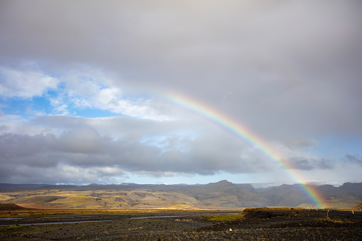 Icelandic landscape with rainbow.
