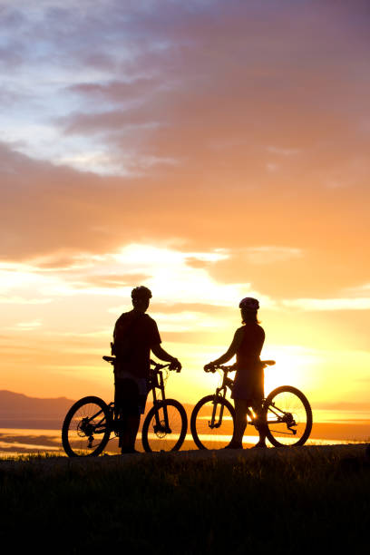 istock Mountain Biking Couple Enjoying Sunset View 172944525