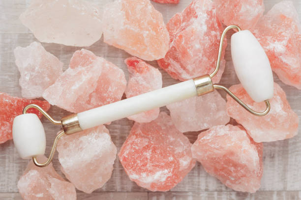 istock Facial anti-age massage roller on quartz stones 1729447148