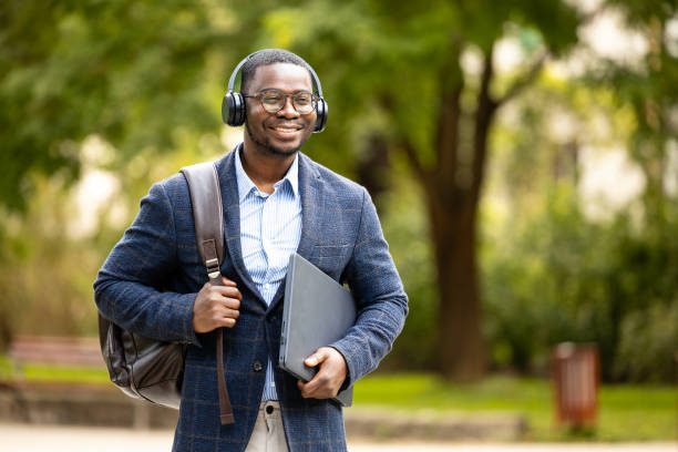 istock Portrait of happy man with laptop going to work. 1729452897