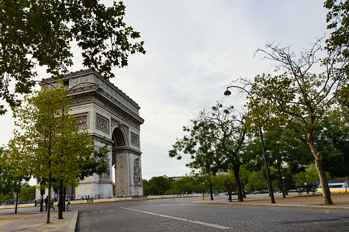 France, Paris, 08/12/2023 The Arc de Triomphe de l'Étoile, one of the most famous monuments in Paris, France, standing at the western end of the Champs-Élysées at the centre of Place Charles de Gaulle