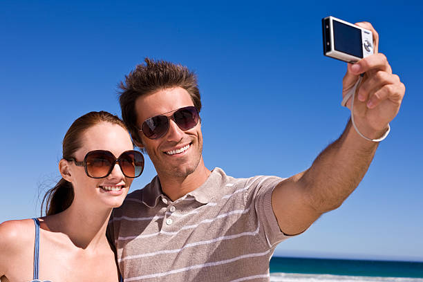 istock Young couple taking self portrait 172946068