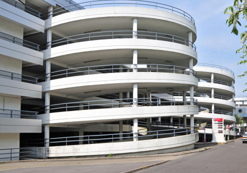The up and down ramps of a multi-story car park.