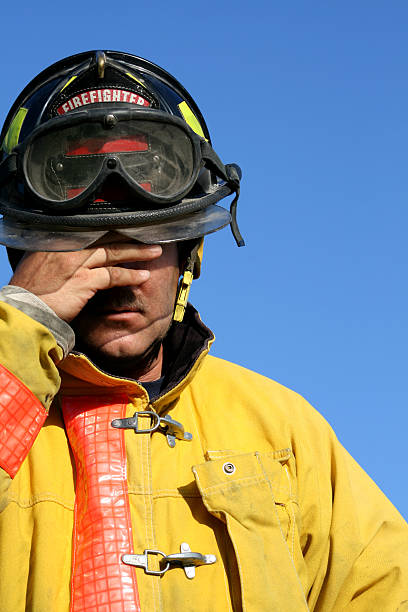 Exhausted Rescuer 250+ Exhausted Firefighter Stock Photos, Pictures & Royalty-Free Images ...