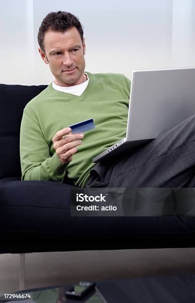 Online Shopping Stock Photo - Download Image Now - Green Color, Laptop, 40-44 Years
