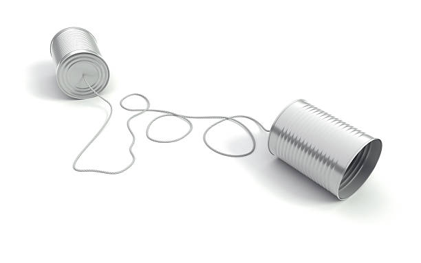 Communication II Two cans. One cord. One of the most well-known metaphors for communication. Detailed royalty free 3d rendering. string telephone stock pictures, royalty-free photos & images