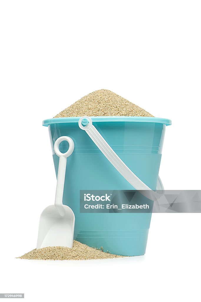 Blue Sand Pail A blue sand pail and shovel against a white background.More in this series: Beach Stock Photo