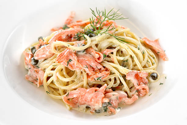 smoked salmon spaghetti stock photo