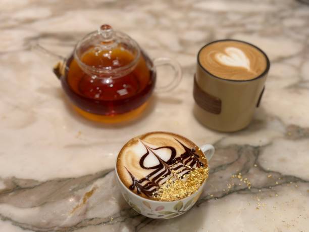 istock Capuchinos gold and tea 1729471442