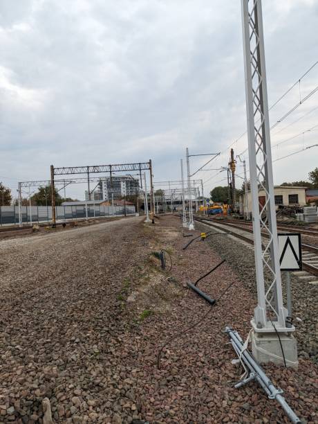 istock Railway tracks converging on the train station platform 1729478938