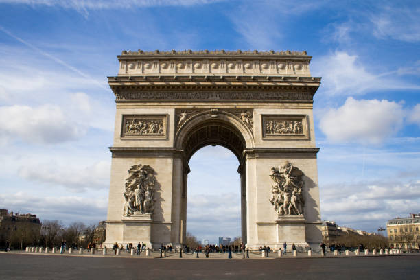 istock Paris Monument under a cloudy blue sky along a paved street 172948415