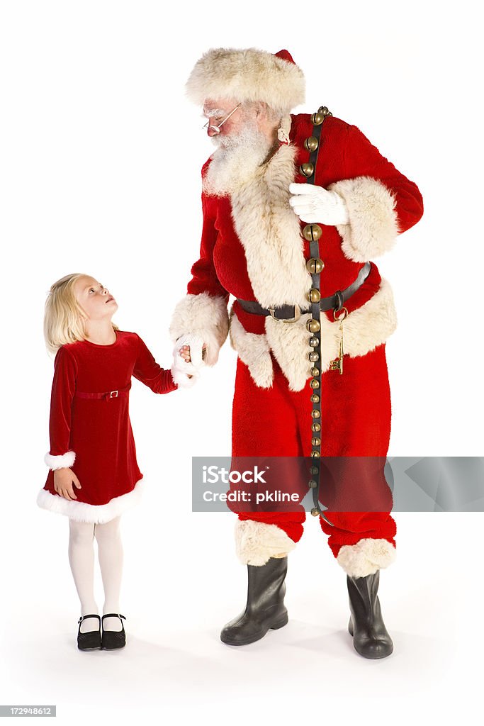 Santa y linda niña sosteniendo las manos - Foto de stock de 4-5 años libre de derechos