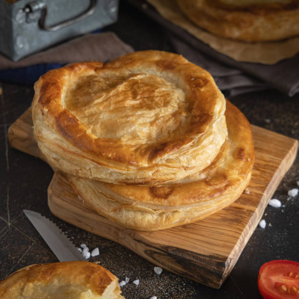 istock Rustico puff pastry from Lecce filled with stuffed with tomato, mozzarella and bechamel sauce 1729490148
