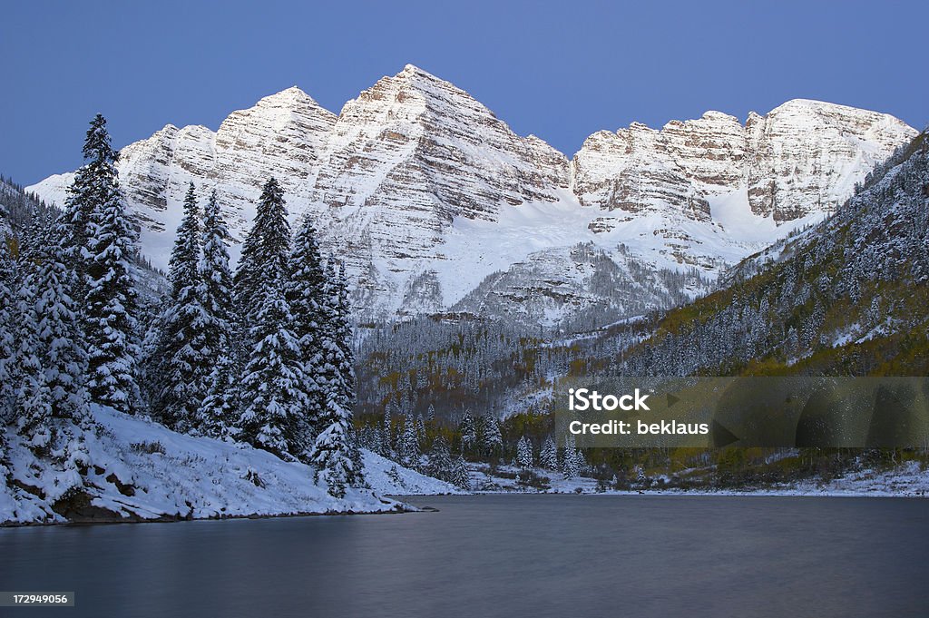 Maroon Bells at Dawn Maroon Bells after an early snow Colorado Stock Photo