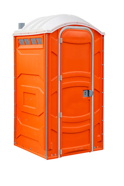 Portable Toilet "Orange portable toilet, isolated on white" portable toilet stock pictures, royalty-free photos & images