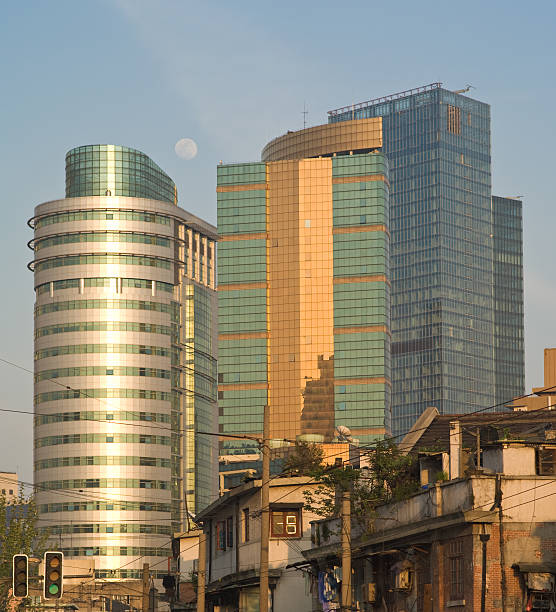 Shanghai Syscrapers behind old houses stock photo