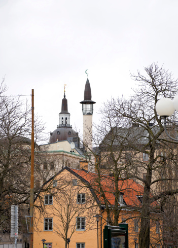 Minaret and church tower close together.See also my LB: