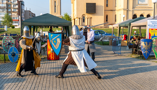 Arad ,Arad Romania - October 01 2023: Fight demonstration with medieval suits knights in combat costume demonstration organized by the City Hall.