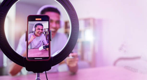 Streamer, live streaming and man gamer with playing video game on social media for connection on vlog. Phone screen, influencer and content creator or person on internet esports show as host Streamer, live streaming and man gamer with playing video game on social media for connection on vlog. Phone screen, influencer and content creator or person on internet esports show as host 4k gaming stock pictures, royalty-free photos & images