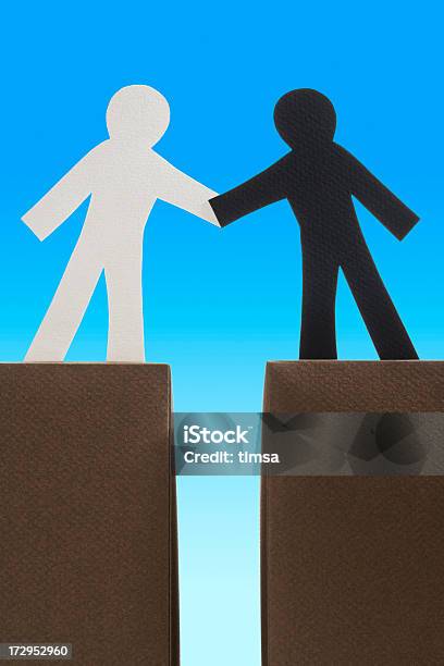 Conquering The Divide Stock Photo - Download Image Now - Bridging The Gap, Agreement, Black Color