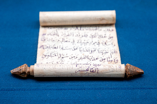 Ancient Arabic writing wrapped on a wooden stick