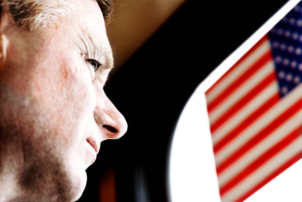 istock Veteran and American flag 172953435