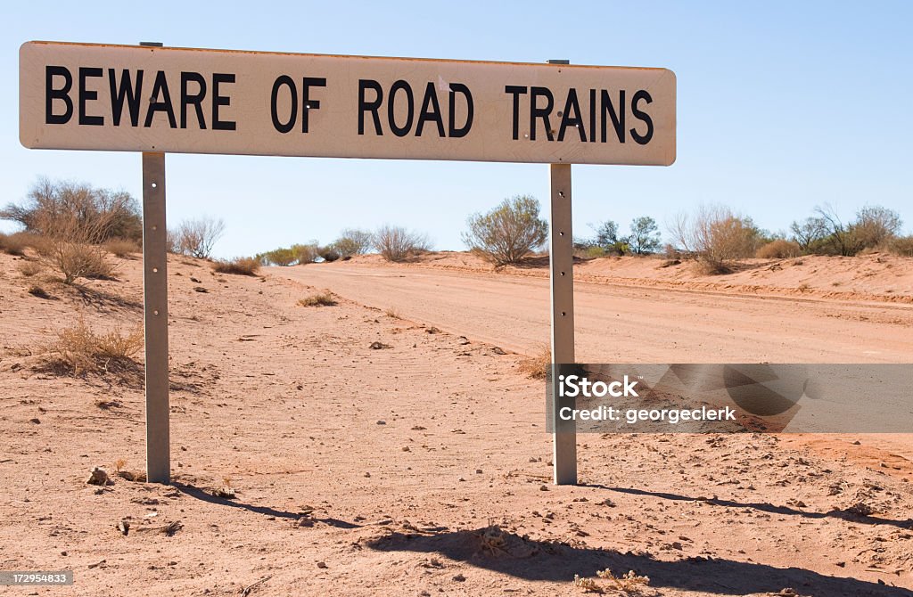 Beware of Road Trains A sign in the Australian Outback. Australia Stock Photo