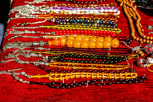 Colorful prayer beads arranged in rows