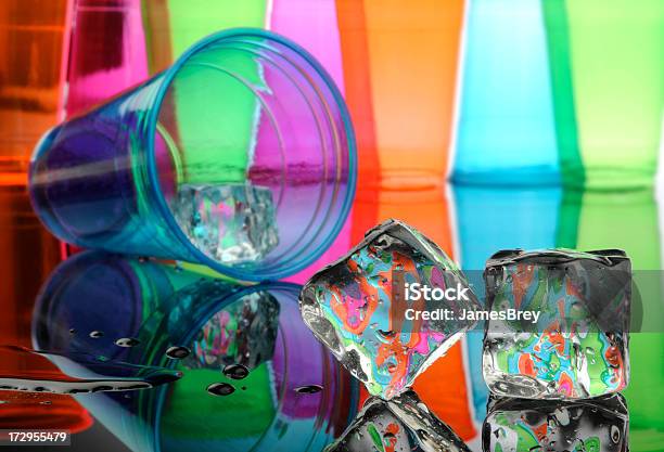 Two Ice Cubes With Plastic Cups Amazing Colors Stock Photo - Download Image Now - Alcohol - Drink, Bar - Drink Establishment, Bar Counter