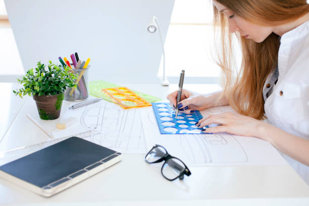 istock Young woman creating car design 1729567942