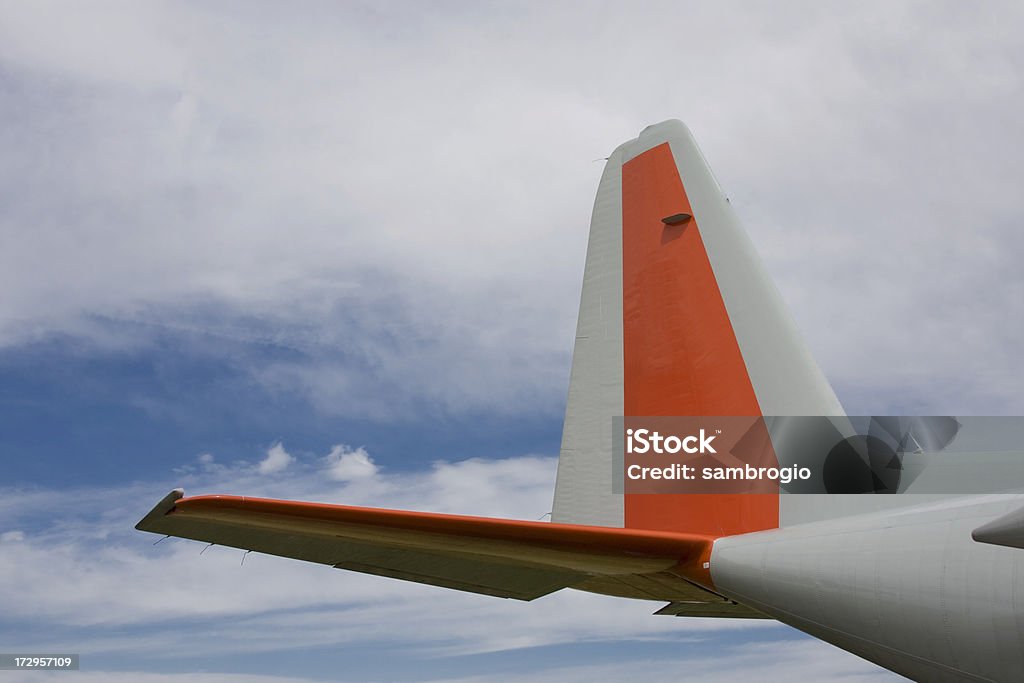 Jumbo Jet Tail Tail Section of a passenger aircraft as it flew over Aerospace Industry Stock Photo