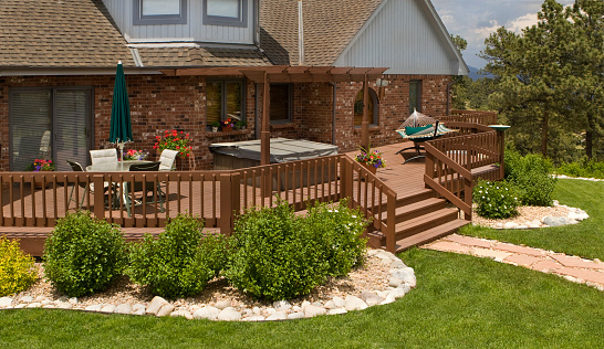 Upscale home & back deck in summer. SEE all SUMMER IMAGES: