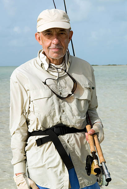 fly fisherman - bonefish photos et images de collection