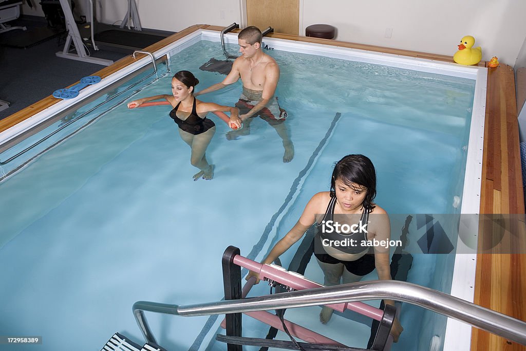 water therapy three people in a water therapy pool. Please view these along with all Physical Therapy Stock Photo