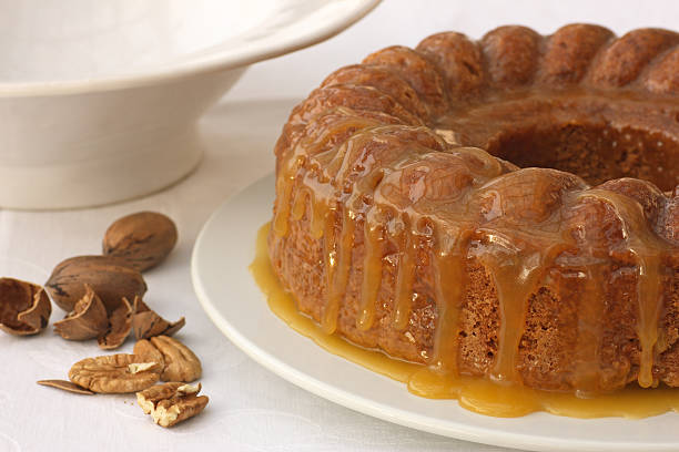 istock delicious apple and pecan nut pound cake with caramel topping 172958665