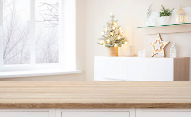 istock Empty wooden table on background of Christmas interior and window 1729589883