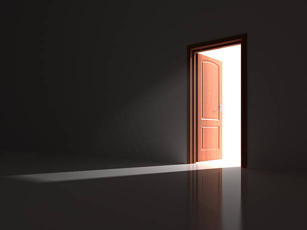 A rich oak door stands partially open with a view to what lies beyond.See my other image of this door: