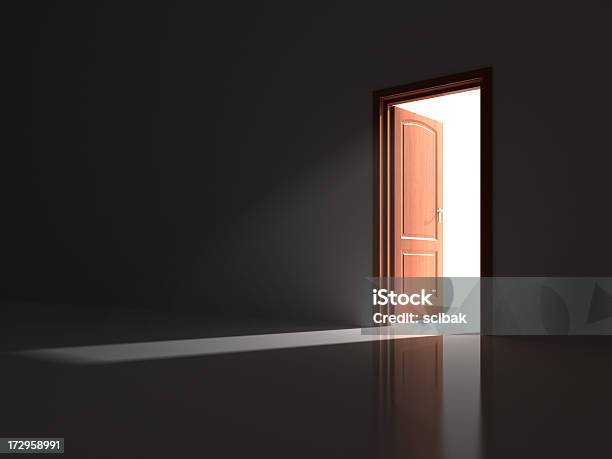 A Red Opened Door Letting Light Into A Dark Room Stock Photo - Download Image Now - Door, Opening, Closing