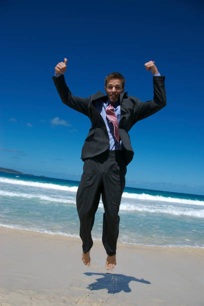 istock Businessman Jumps with Thumbs Up 172960104
